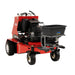 Close-up view of the front-mounted broadcast spreader attached to the Classen SA30 stand-on aerator. The black spreader hopper is supported by a sturdy metal frame and includes a directional control plate, designed for efficient lawn material distribution.