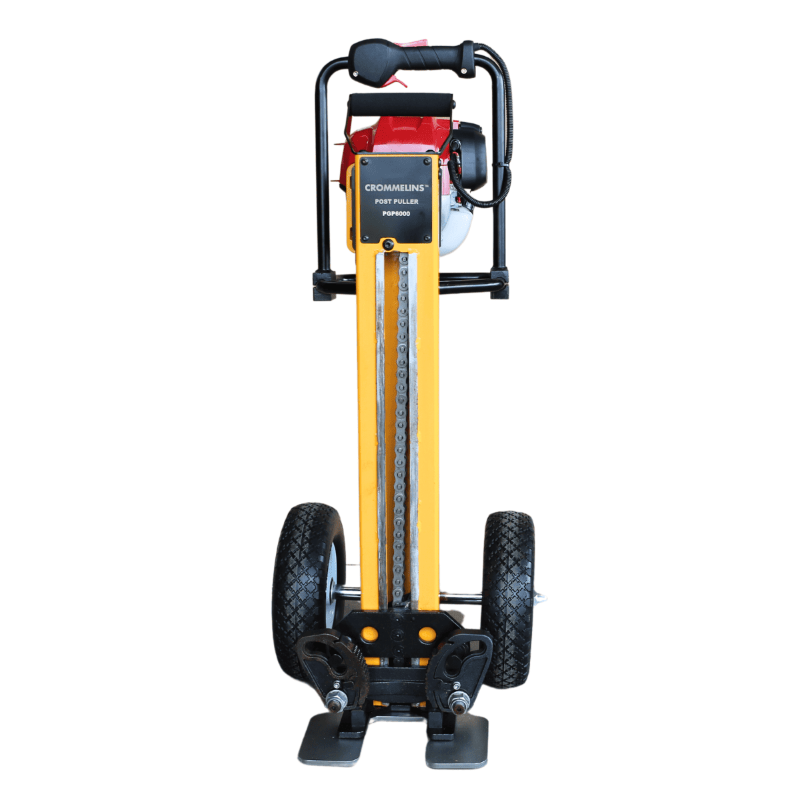 Crommelins post puller with yellow steel frame, black dual wheels, and mounted Honda engine, standing upright on a plain white background, designed for efficiently removing fence posts and star pickets in professional landscaping and agricultural work.