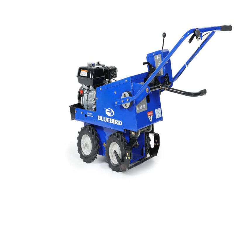 Crommelins Bluebird 18-inch sod and turf cutter with black petrol engine, blue steel body, and rugged treaded wheels, photographed from a left-side angle on a plain white background, designed for efficient grass and turf removal.