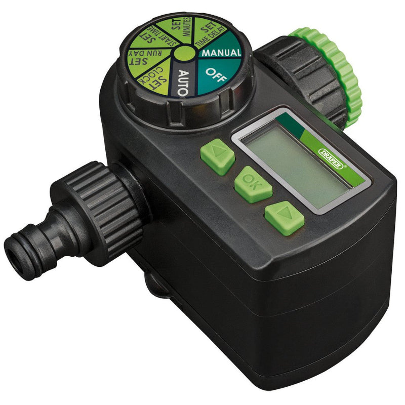 This Draper Ball Valve Electronic Water Timer features a black body with a large top dial showing settings like "Auto," "Manual," and "Off." It includes an LCD screen, bright green control buttons, and standard hose connectors for automated garden irrigation.