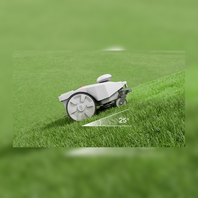 FJD FRX Robotic Lawn Mower climbing a 25° grass slope, showcasing its all-terrain traction and stable mowing performance on steep commercial landscapes, golf courses, and sports fields