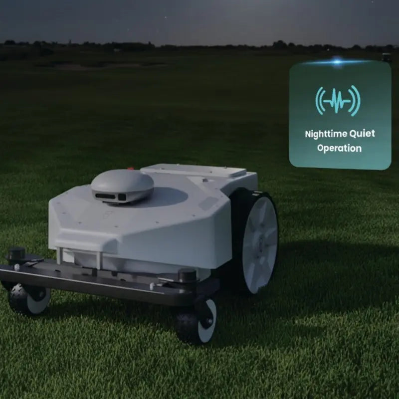 FJD FRX Robotic Lawn Mower operating quietly at night on a commercial lawn, highlighting low-noise autonomous mowing for uninterrupted turf maintenance in noise-sensitive environments