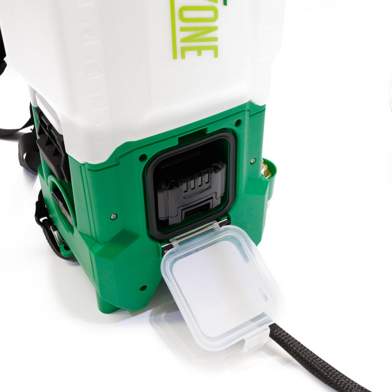 The image displays a close-up view of a green and white FlowZone battery-powered backpack sprayer, likely a model such as the Typhoon or Cyclone. The focus is on a black, rectangular compartment located on the side of the sprayer, which has a clear, hinged lid opened to reveal the internal components, possibly the battery housing or a connection port. Part of the "ONE" branding is visible on the upper white section of the sprayer. 