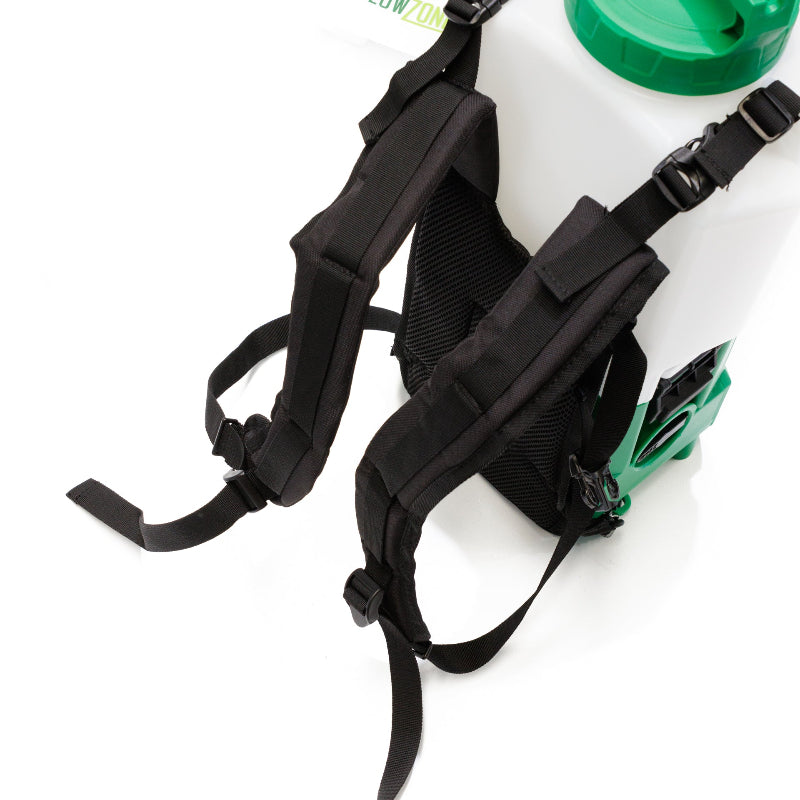 The image displays the back of a black and green backpack sprayer, likely a FlowZone Cyclone 3 Battery Powered Backpack Sprayer, featuring its padded shoulder straps and adjustable harness system designed for comfortable wear. The green elements visible are part of the sprayer's tank and components. 