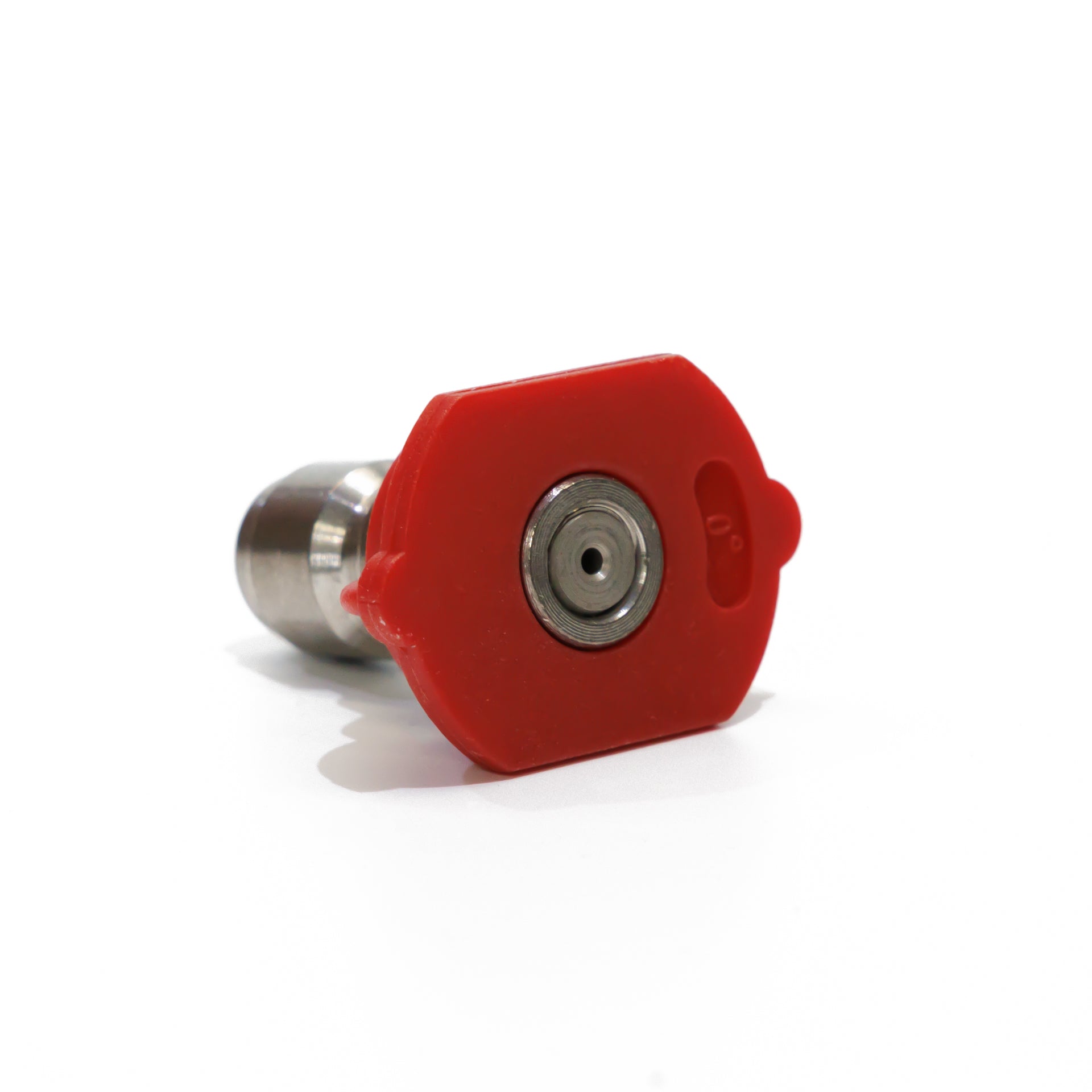 Close-up of FlowZone 0-degree red pin nozzle tip for backpack sprayers, designed for high-pressure pinpoint spray applications and deep cleaning performance.