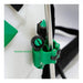 The image displays a close-up of green plastic nozzle holders attached to a metal wand, which is part of a larger piece of equipment, likely a backpack sprayer. The text "Nozzle Holders" is visible, indicating the function of the green clip-like components, which are designed to secure sprayer nozzles or the spray wand itself. The background shows part of a white tank and black straps, consistent with a backpack sprayer design. 