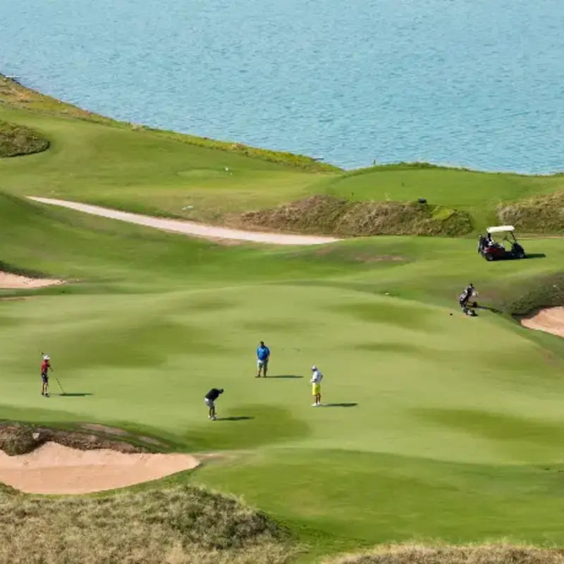 Scenic golf course showcasing pristine fairways and greens maintained for professional play, highlighting the ideal environment for the FJD FRX Robotic Lawn Mower and autonomous commercial turf maintenance.