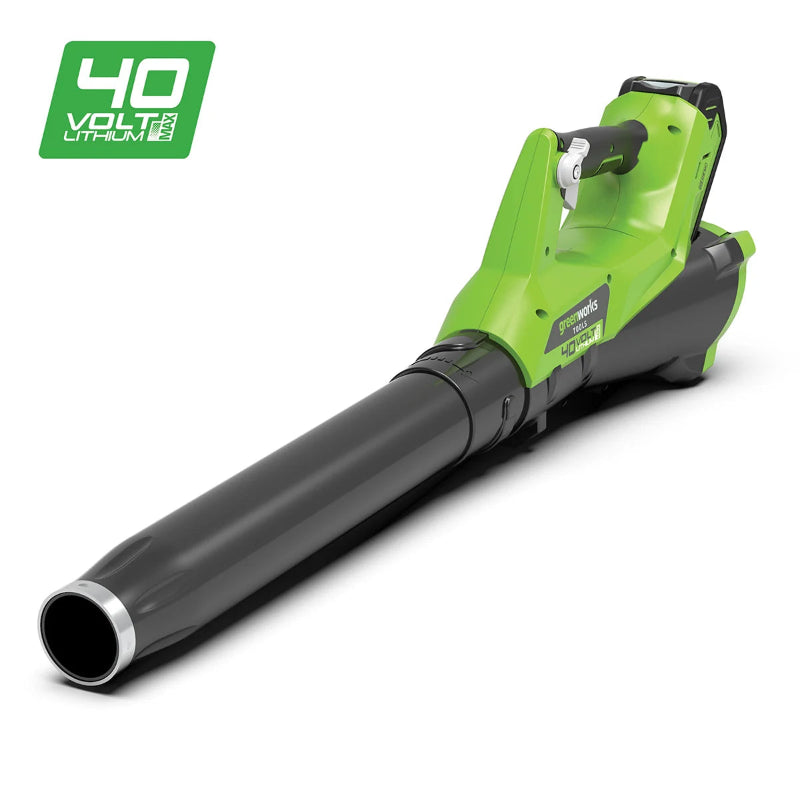 Greenworks 40V Blower cordless unit shown at low front angle with long black nozzle, bright green body, trigger handle, and rear battery pack. Pictured on a clean white background with a green “40 Volt Lithium” badge in the corner.
