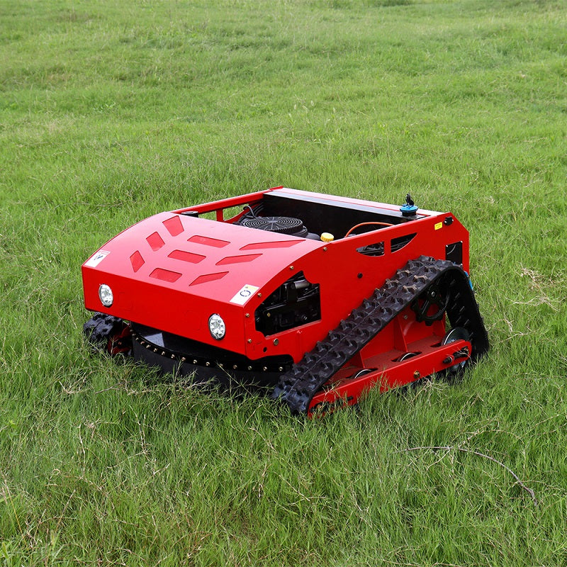 HighTop HT850 remote-controlled tracked lawn mower operating on grassy terrain, showing its red body, wide rubber tracks, and slope-mowing capability.