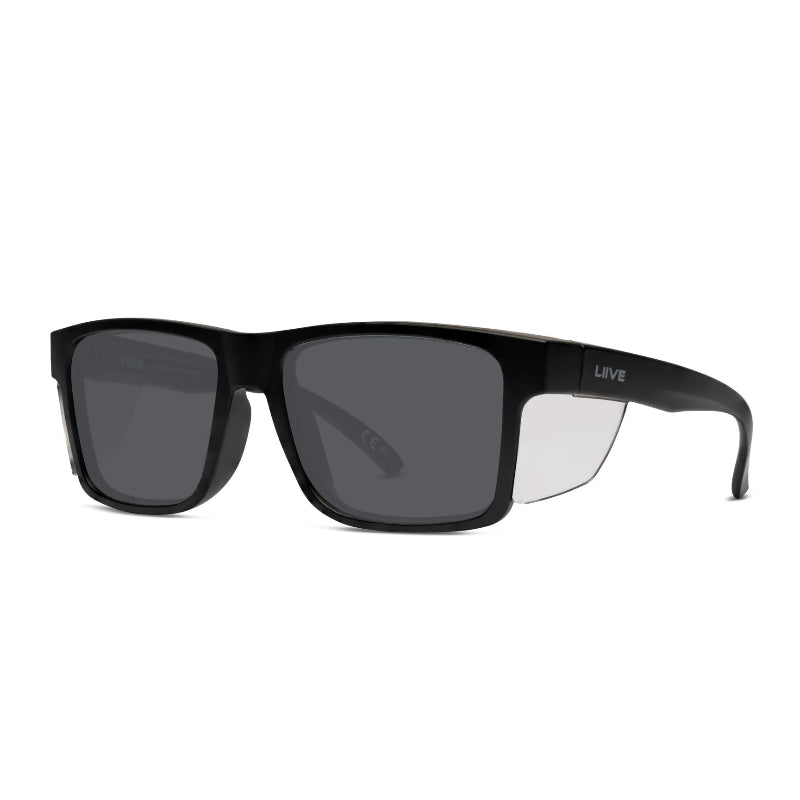 LIIVE Safety Tradie Polarised sunglasses in matte black with clear side blinkers and smoke lenses. Durable wraparound design for superior eye protection, UV blocking, and comfort—ideal for tradies and outdoor professionals.