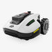 White Mammotion Yuka Mini robotic lawn mower shown from a front angle, highlighting rugged wheels, compact body, and smart sensor system, displayed on a plain white background.