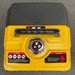 It is the top view of a RATO R1250i Silent Inverter Generator, which is primarily yellow with a black top cover and handle. Prominently featured is a silver fuel cap with a fuel pump icon and a "DANGER" warning about fire risk and the need to stop the engine before refueling. 