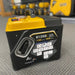 The image displays a RATO R1250i gasoline inverter generator, primarily black with a prominent yellow top and handle. The generator is compact and features a quick start guide diagram on its side panel, illustrating the steps for starting the unit. The label on the generator indicates its model number, R1250i, and highlights its "GASOLINE INVERTER GENERATOR" type, with "1100 STARTING" and "1000 RUNNING" specifications for its power output. 