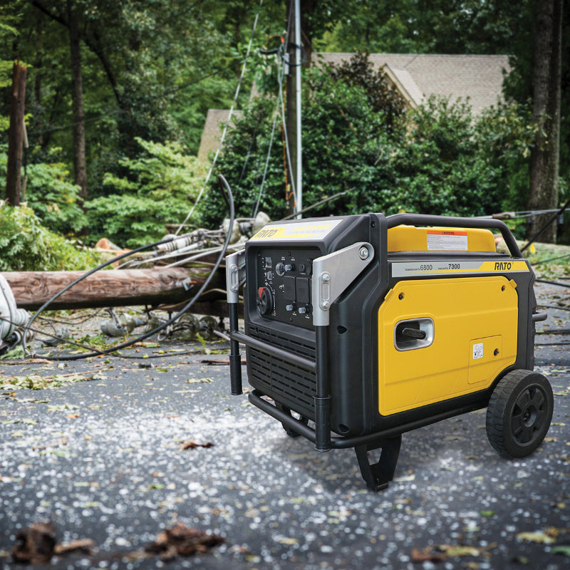 Rato R8000iE inverter generator in yellow and black positioned outdoors on a paved surface after a storm, with fallen power lines and trees in the background. Heavy-duty 7300W generator designed for reliable emergency backup and rugged performance.