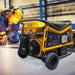 Rato R8500D-3 industrial generator powering welding equipment in a workshop. Heavy-duty 8.5kW petrol generator with 499cc OHV engine and AVR technology, providing reliable electricity for high-output tools and industrial applications. Built with a rugged steel frame and portability wheels.