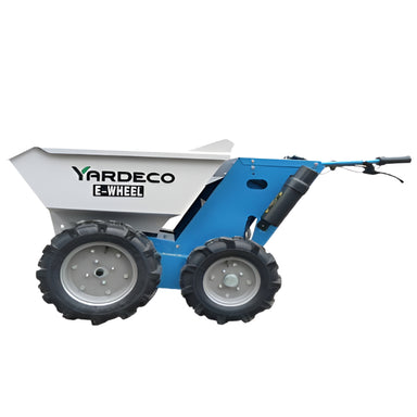 Yardeco E-Wheel electric-powered mini dumper featuring a sturdy white tipping tray, robust blue steel frame, and four large heavy-duty off-road tyres. Designed for efficient material transport, it includes ergonomic handlebar controls and a compact, manoeuvrable build for landscaping, gardening, and construction tasks.
