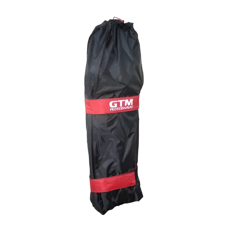 Crommelins GTM Professional black carry bag with red straps and white logo, cylindrical shape with drawstring closure at the top, photographed from the front-side angle on a plain white background, designed for storing and transporting the Elephant’s Trunk harness.